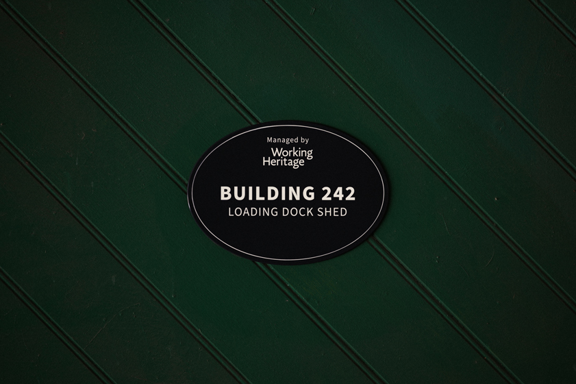 Micio_Portfolio_Jack's Magazine_heritage plaque_loading dock shed