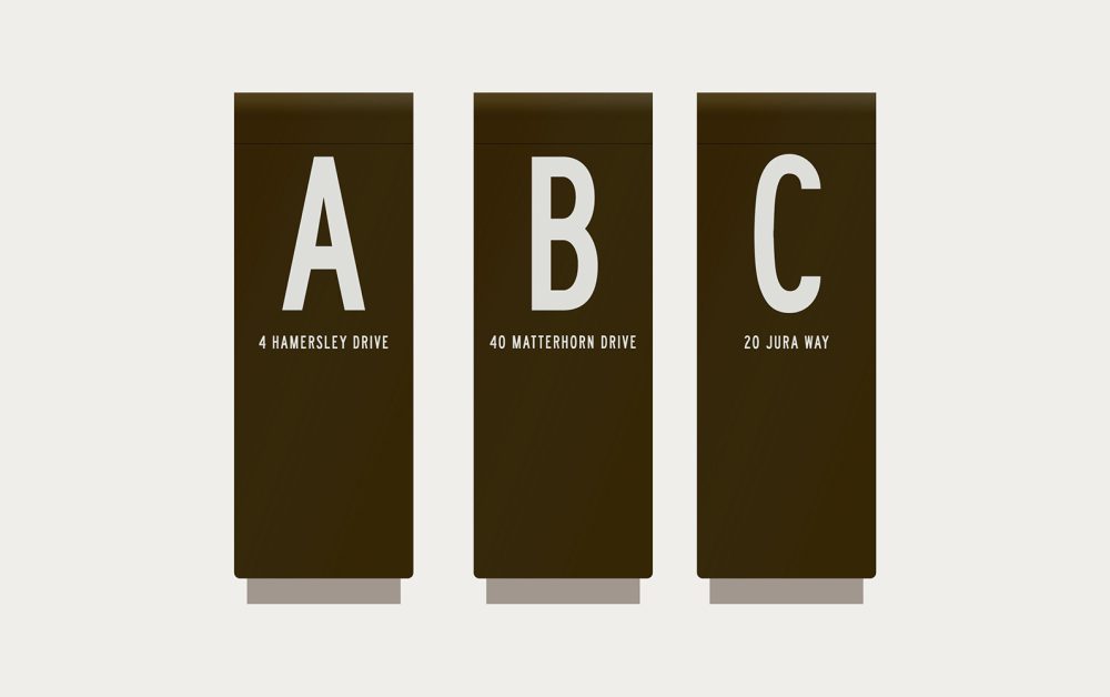 Three building identification pylon signs at Maybloom Clyde North